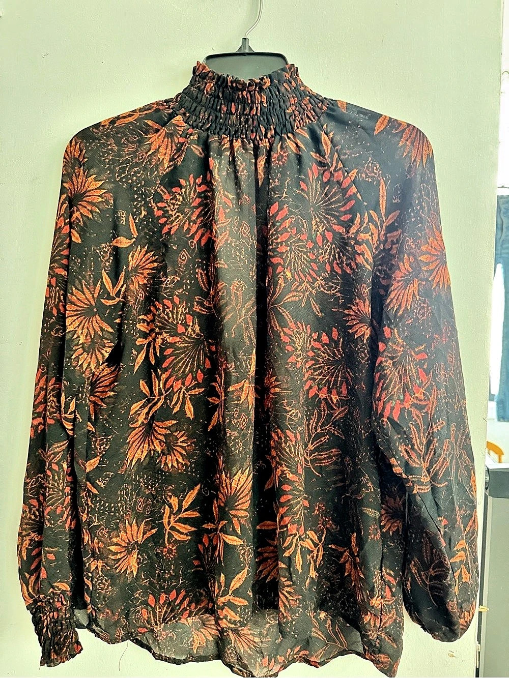 H&M 
CONSCIOUS Floral Blouse in Black & Orange Like New